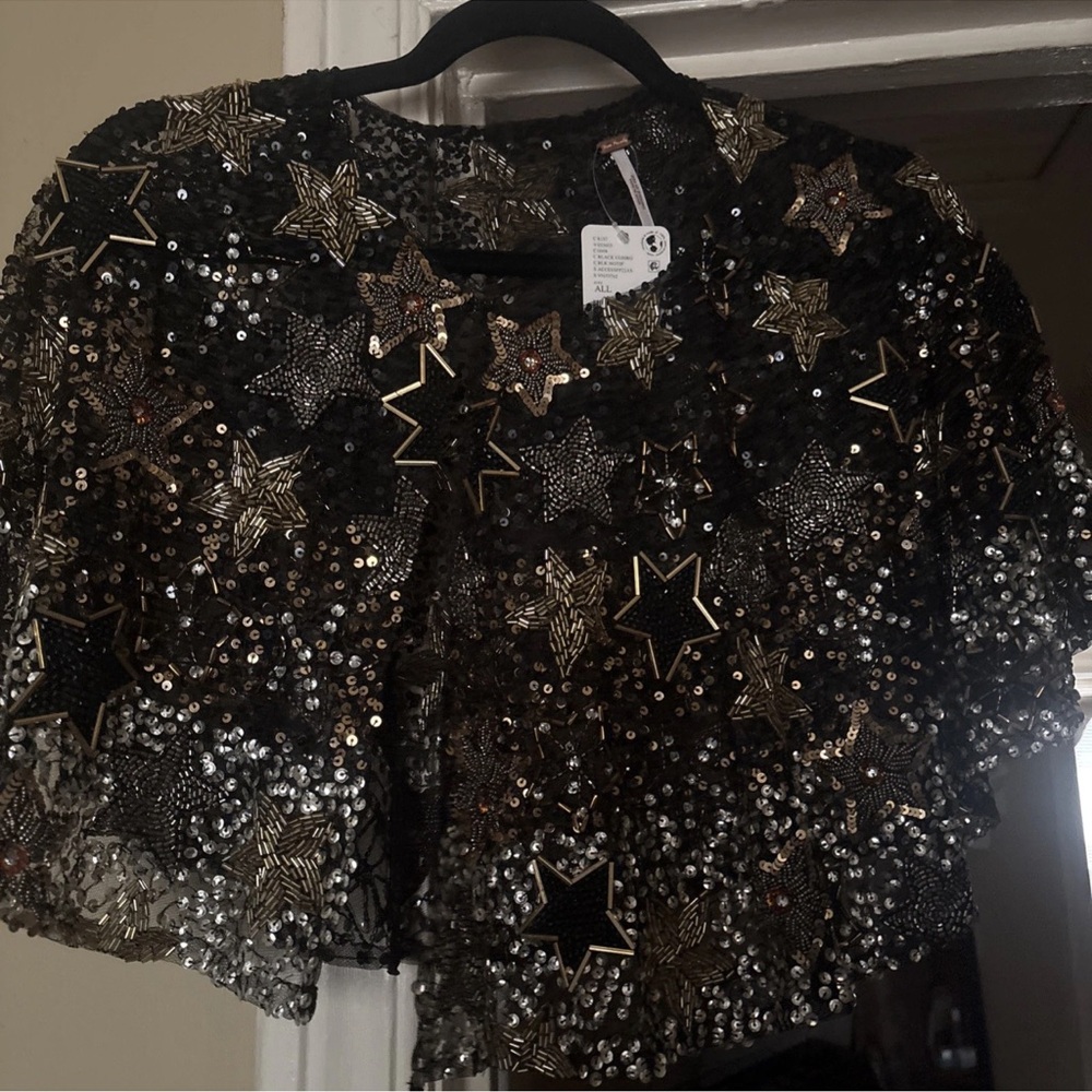 Free people SOLD OUT,  NWT stars of the show beaded cape